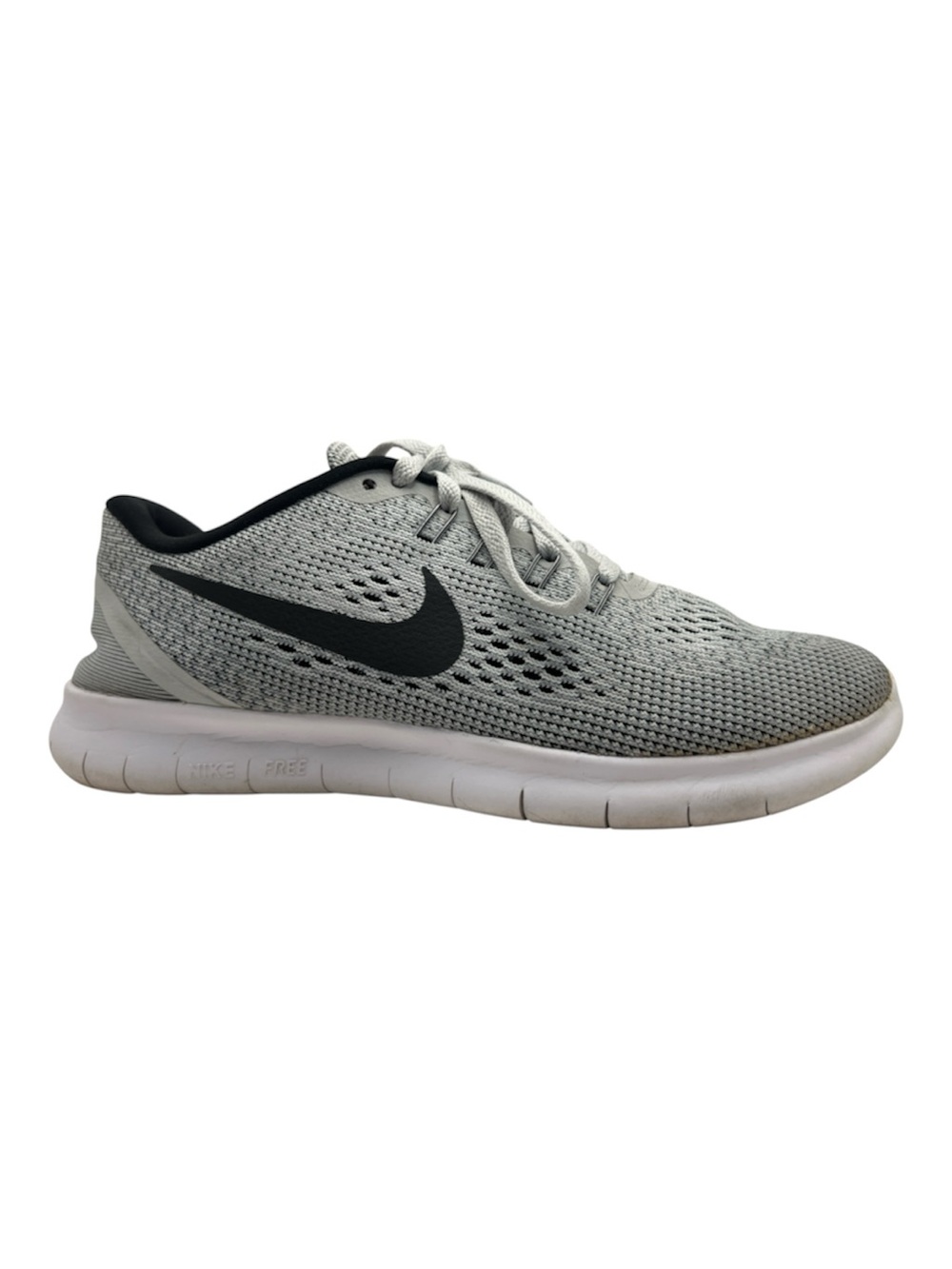 Nike Free RN running shoe featuring a black Swoosh and a white SZ 7.5